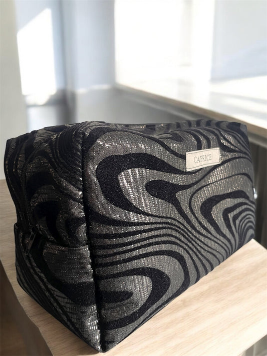 La trousse de toilette Lava